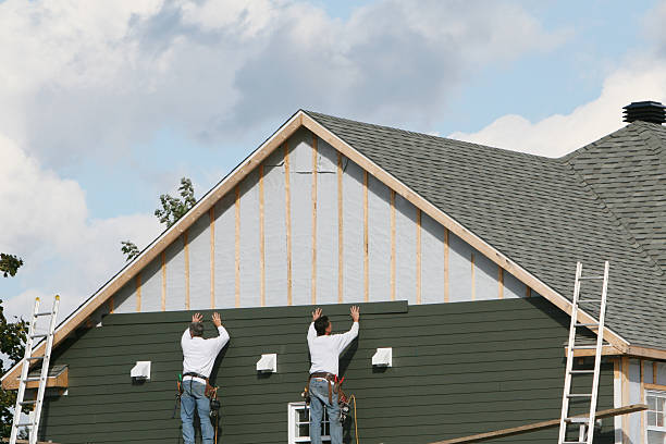 Professional Siding Repair technician working in Carle Place, NY